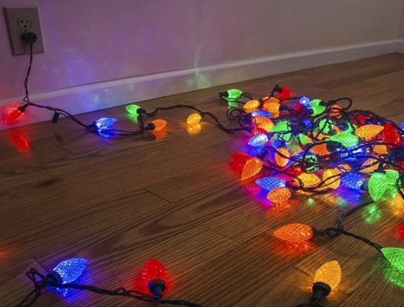 Holiday lights strung out on floor